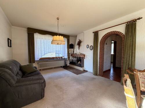 Großzügiges Wohnzimmer - Einfamilienhaus mit 97,00 m&sup2; in Norderstedt zum Kaufen