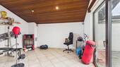Hobbyraum mit Kamin - 