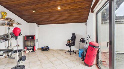 Hobbyraum mit Kamin - 