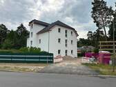Fassade - Etagenwohnung mit 68,60 m² in Eggersdorf zum Kaufen