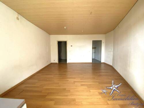 Wohnzimmer 1.1 - 1 Zimmer Etagenwohnung in Wendtorf