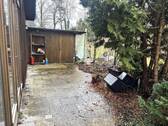 Terrasse und Holzschuppen - 
