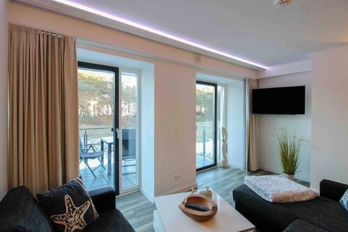 Wohnzimmer - 3 Zimmer Etagenwohnung zum Kaufen in Binz