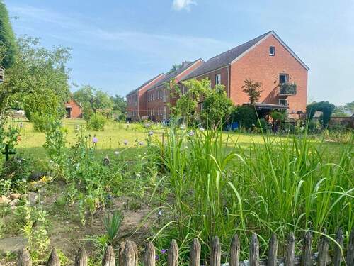 Wohnanlage Seitensicht - 3 Zimmer Mehrfamilienhaus, Wohnhaus zum Kaufen in Dannenberg (Elbe) Tramm / Tramm