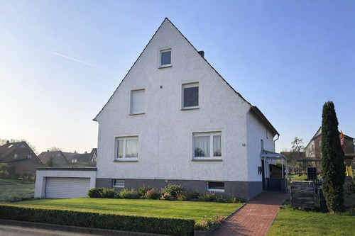 Strassenansicht - 6 Zimmer Mehrfamilienhaus, Wohnhaus zum Kaufen in Bünde