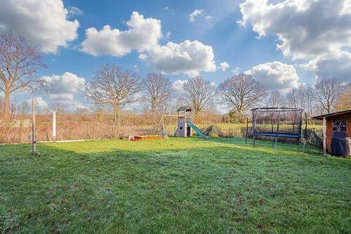 Blick in den Garten - 5 Zimmer Einfamilienhaus zum Kaufen in Kisdorf