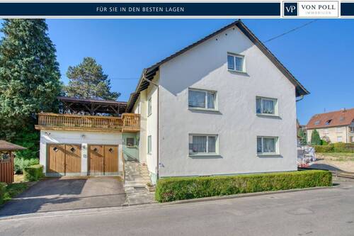 Titelbild - Zweifamilienhaus mit Ausbaupotenzial und vielseitigen Nutzungsmöglichkeiten