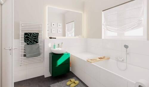 Im hellen Bad mit Badewanne und Dusche starten Sie entspannt in den Tag und lassen ihn in Ruhe ausklingen - 