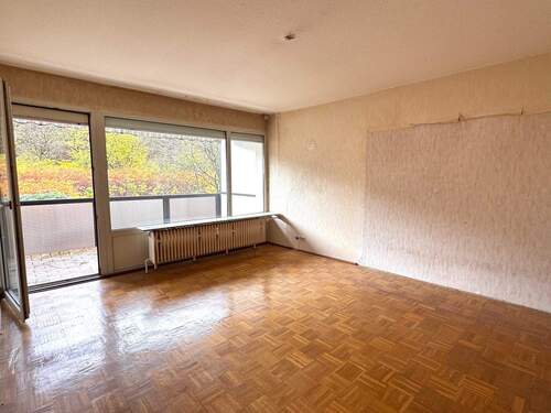 4. Wohnzimmer.jpg - 2 Zimmer Etagenwohnung zum Kaufen in Lüdenscheid