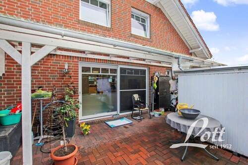 überdachte Terrasse - Doppelhaushälfte mit 127,70 m&sup2; in Edewecht / Portsloge zum Kaufen