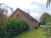 Seitenansicht - 6 Zimmer Mehrfamilienhaus, Wohnhaus in Jade