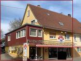 Ansicht Exposé - Doppelhaushälfte mit einer Wohnung und vermietetem Ladengeschäft