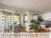 Blick v.d. Balkontür auf die integrierte Küche - 3 Zimmer Etagenwohnung in München