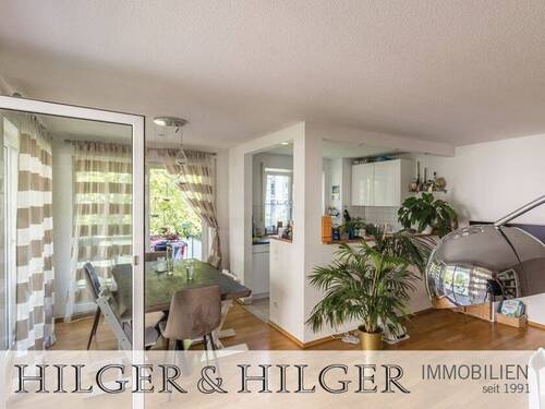 Blick v.d. Balkontür auf die integrierte Küche - 3 Zimmer Etagenwohnung in München