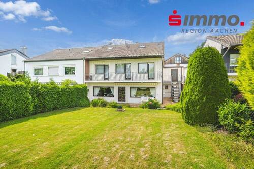 Titelbild - Attraktives Einfamilienhaus im Bungalowstil mit sonnigem Grundstück und Garage