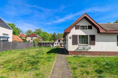 Seitenansicht - Einfamilienhaus mit 65,00 m² in Berlin zum Kaufen