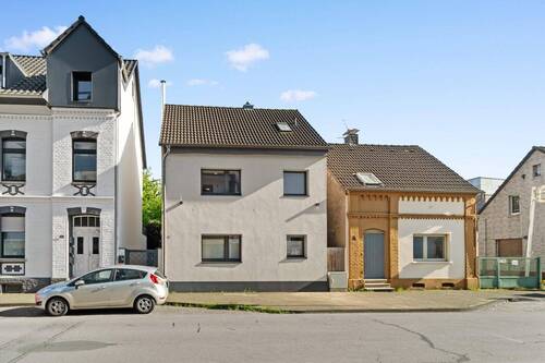 Frontansicht - 6 Zimmer Einfamilienhaus zum Kaufen in Langenfeld