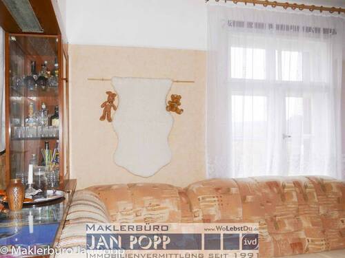 Wohnzimmer mit Raumteiler - 