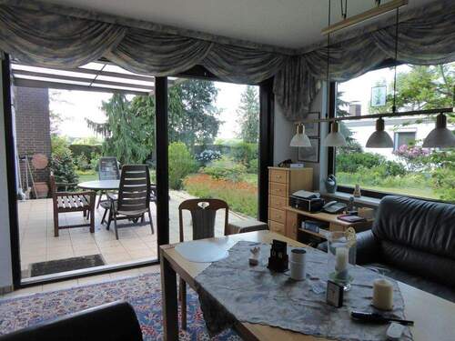 Wintergarten mit Gartenblick - 