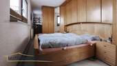 Schlafzimmer mit Arbeitsbereich (optisch getrennt) - 
