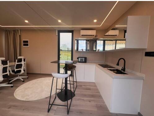 Moderne Wohnküche mit intelligenter Raumaufteilung und Panoramaverglasung - 2 Zimmer Mehrfamilienhaus, Wohnhaus zum Kaufen in Ering am Inn