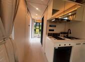 Lichtdurchfluteter Minihaus-Flur mit Panoramablick und kompakter Designküche - maximale Raumnutzung auf kleinstem Raum! - 