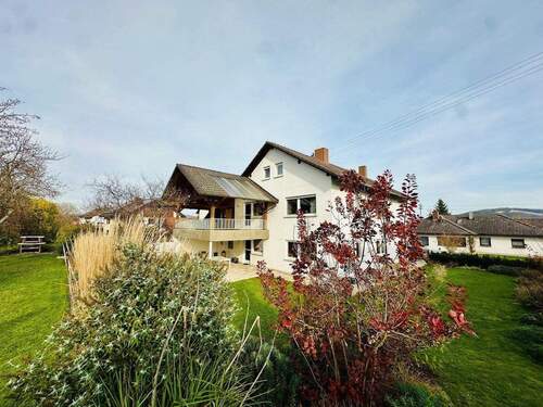 Südwestansicht - Modernisiert, großzügig und vielseitig - Einfamilienhaus mit Wohlfühlcharakter