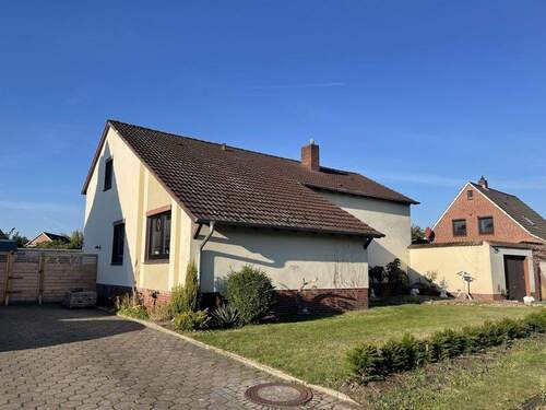 Straßenansicht - 6 Zimmer Einfamilienhaus zum Kaufen in Schortens