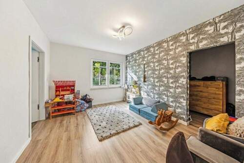 Schlafzimmer I mit Bad en Suite EG - 