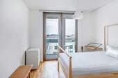 Schlafzimmer mit Zugnag zur Loggia - 
