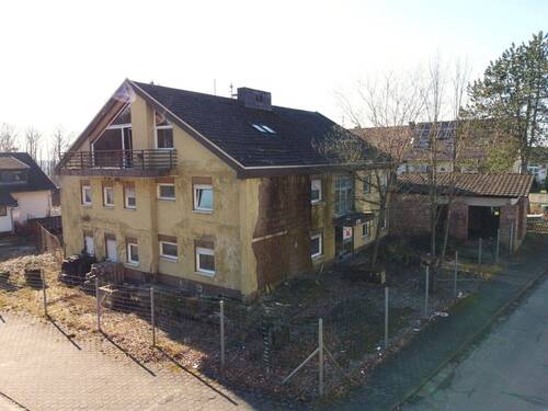 Seitenansicht - 2 Zimmer Mehrfamilienhaus, Wohnhaus in Großsteinhausen