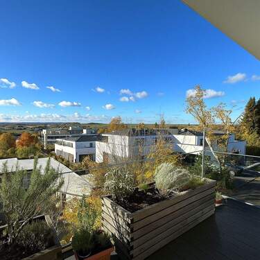 Titelbild - Lichtdurchflutete Wohnung mit traumhaftem Ausblick und modernem Wohnkomfort