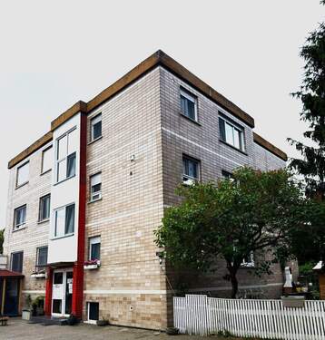 Hausansicht - Attraktive Souterrainwohnung mit praktischen Schnitt