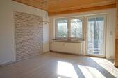 Wohnzimmerbereich mit Ausgang zur Dachterrasse - 