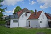 Seitenansicht mit Wintergarten - 6 Zimmer Einfamilienhaus in Schiffdorf