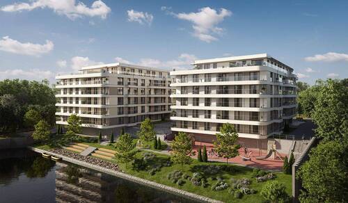 Moderne Eigentumswohnungen direkt am Rhein - Attraktive Wohnung mit Südbalkon und Gäste-WC