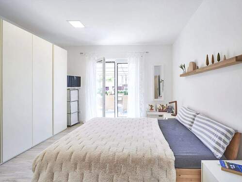 Beispiel-Schlafzimmer - Doppelhaushälfte mit 140,00 m² in München zum Kaufen