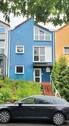 Hausansicht - Gepflegtes Reihenmittelhaus in Waldsolms mit Garten, Terrasse und zwei Stellplätzen!