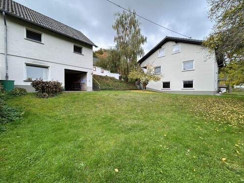 Doppelgarage + Wohnhaus - 