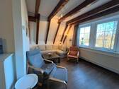 Wohnzimmer - 2 Zimmer Etagenwohnung zum Kaufen in Wurster Nordseeküste