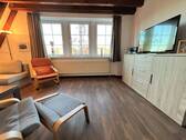 Wohnzimmer - Etagenwohnung mit 41,00 m&sup2; in Wurster Nordseeküste zum Kaufen