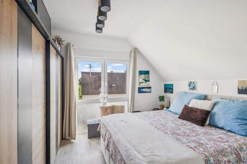 Schlafzimmer im Dachgeschoss - 