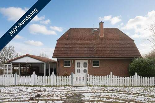 Titelbild - Großzügiges Einfamilienhaus mit Kachelofen am Feldrand in Ortsrandlage