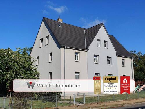 Titelbild - Mehrfamilienhaus in zentraler Lage mit viel Grün