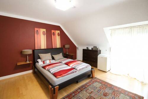 Schlafzimmer mit Balkon - 