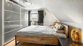 1. OG Schlafzimmer 1 - 