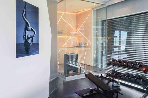 14 Glassauna und Fitnessecke - 