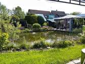 Gartenteich - Einfamilienhaus mit 163,00 m&sup2; in Schortens zum Kaufen