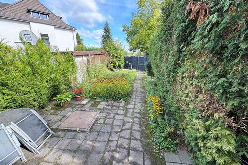 Garten - Einfamilienhaus mit 104,00 m&sup2; in Köln zum Kaufen
