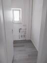 Abstellraum mit Waschmaschinenanschluss - 